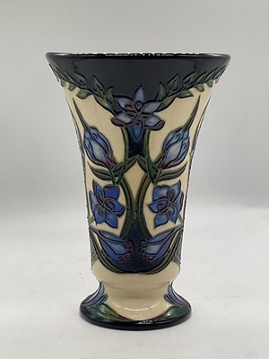 Lot 200 - MOORCROFT: a 'Kaffir Lily' pattern vase by...