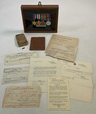 Lot 60 - A WWII MID medal group and associated...