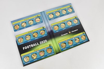 Lot 606 - FOOTBALL 2020; an album containing twenty-four...