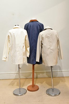 Lot 1964 - HARRODS; a full length blue lady's trench coat,...
