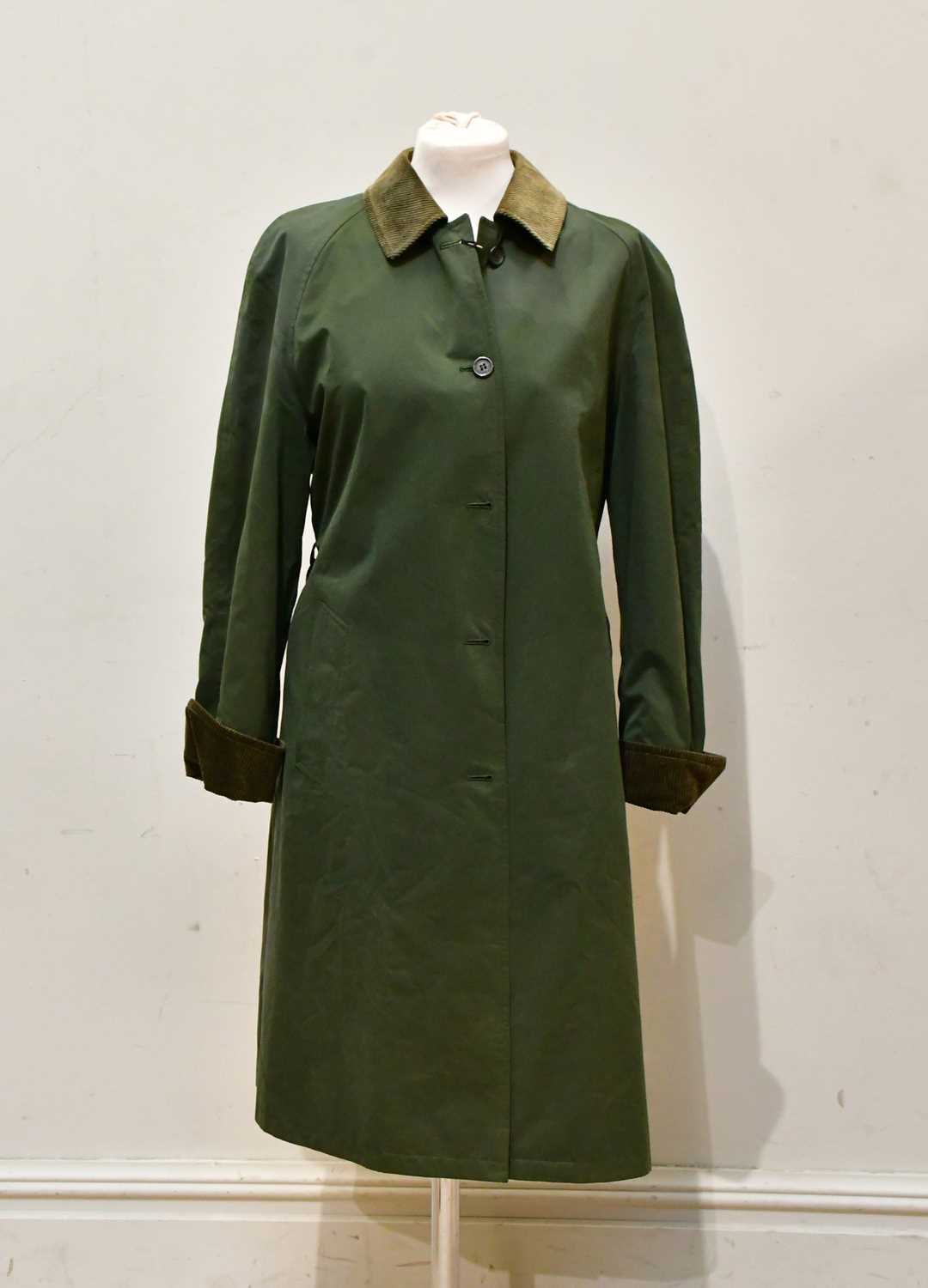 Lot 1999 - BURBERRY; a full length lady's green trench...