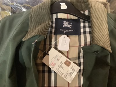Lot 1999 - BURBERRY; a full length lady's green trench...