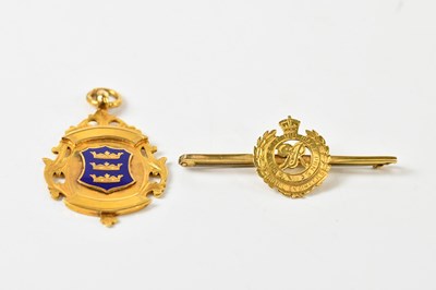 Lot 1220 - A 9ct yellow gold and enamel fob medal and a...