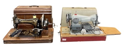 Lot 423 - FRISTER & ROSSMANN; a sewing machine in inlaid...