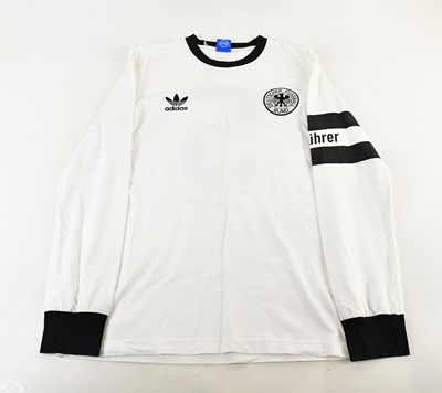 Lot 1207 - BECKENBAUER; a Germany retro style football...