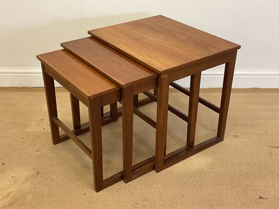 Lot 835 - A mid 20th century teak nest of tables, height...