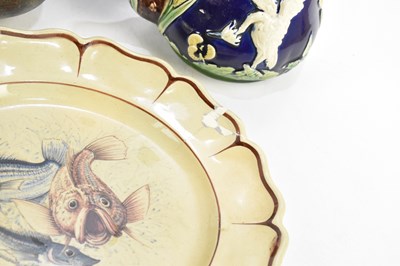 Lot 650 - A Victorian majolica teapot, relief decorated...
