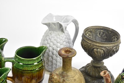 Lot 650 - A Victorian majolica teapot, relief decorated...