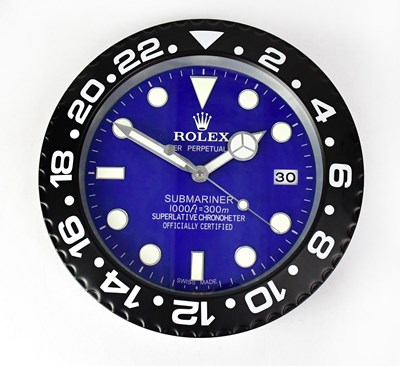 Lot 141 - A “Rolex” dealer's display wall clock modelled...