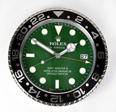 Lot 142 - A “Rolex” dealer's display wall clock modelled...