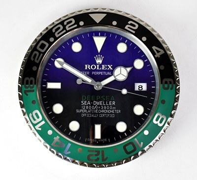 Lot 144 - A "Rolex" dealer's display wall clock modelled...