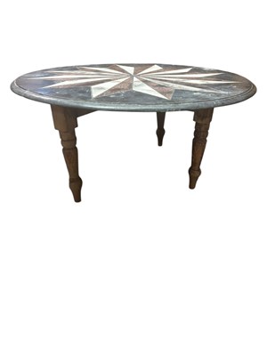 Lot 215 - A slate and marble circular coffee table with...