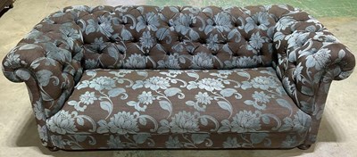 Lot 775 - A Chesterfield sofa, later reupholstered in...