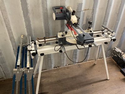 Lot 744 - AXMINSTER; a 250mm slide mitre saw, together...