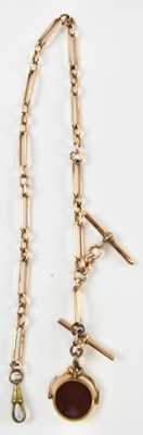 Lot 1008 - A 9ct rose gold pocket watch chain, with...