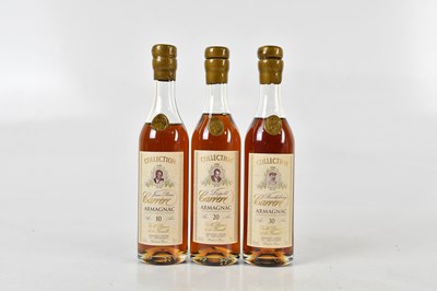 Lot 856 - ARMAGNAC; a cased set of three half bottles...