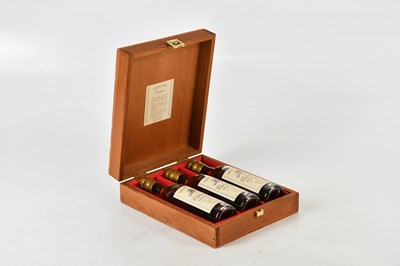 Lot 856 - ARMAGNAC; a cased set of three half bottles...