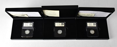 Lot 1014 - Three cased silver coins, comprising 'Jersey...