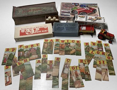 Lot 118 - A collection of vintage games and puzzles, to...