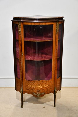 Lot 32 - A reproduction serpentine fronted vitrine with...