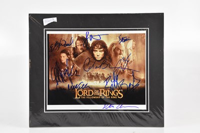 Lot 1061 - THE LORD OF THE RINGS; a signed mounted print...