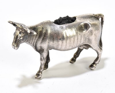 Lot 1067 - A 19th century silver pin cushion modelled as a cow