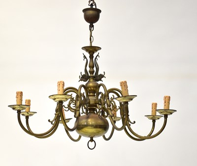 Lot 87 - A brass eight-branch electrolier with fish...