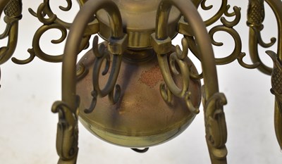 Lot 87 - A brass eight-branch electrolier with fish...