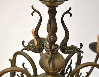 Lot 87 - A brass eight-branch electrolier with fish...