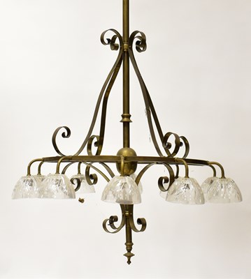 Lot 91 - A large brass light fitting, with long drop...