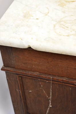 Lot 29 - A pair of early 20th century French oak marble...