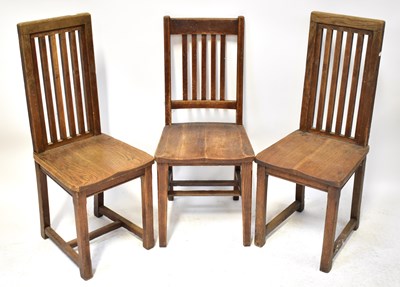 Lot 52 - A set of six rustic oak slat-back chairs, with...