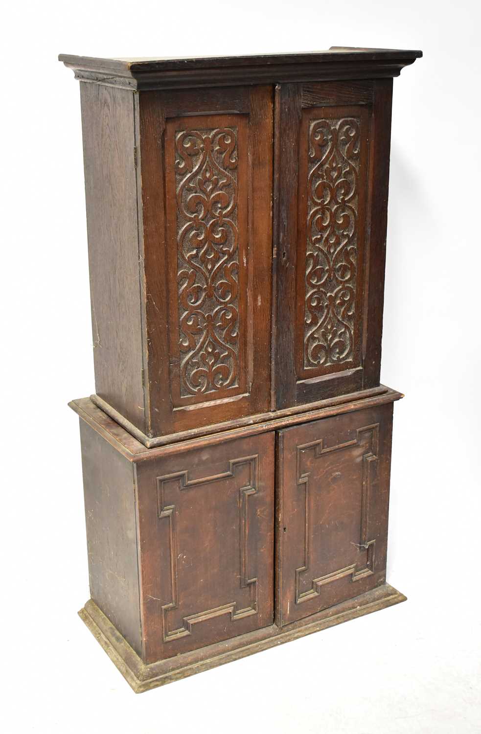 Lot 10 - A small oak wall-hanging two-door cabinet, 54...