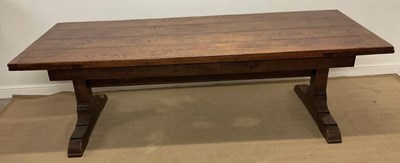 Lot 754 - A reproduction oak plank top draw-leaf...