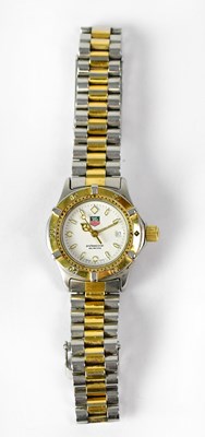 Lot 1138 - TAG HEUER; a ladies' stainless steel...