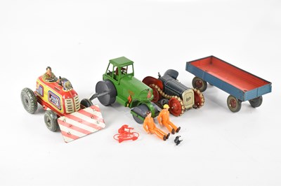 Lot 897 - A tinplate wind-up bulldozer, with two...