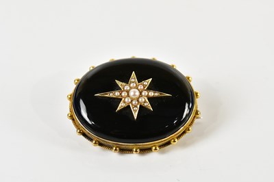 Lot 1238 - A Victorian yellow metal framed black onyx and...