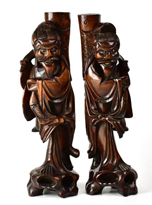 Lot 221 - A pair of Oriental carved rootwood figures of...