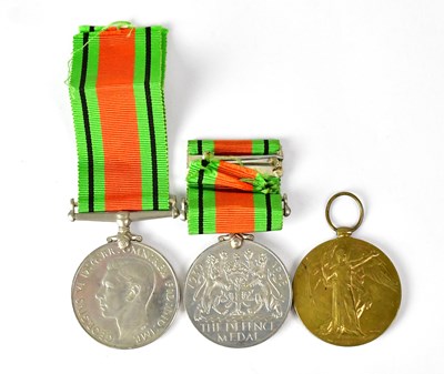 Lot 704 - A duo of unnamed WWII Defence Medals, both...