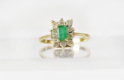 Lot 768 - A yellow metal ring set with an emerald...