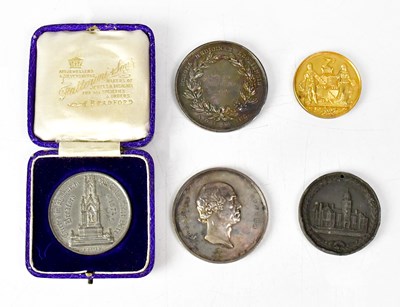 Lot 710 - A group of five medals, to include two medals...