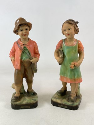 Lot 228 - A pair of 1930s plaster figures of a boy and...