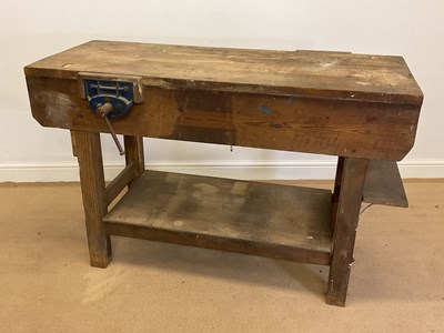 Lot 729 - A wooden work bench with two vices mounted on...