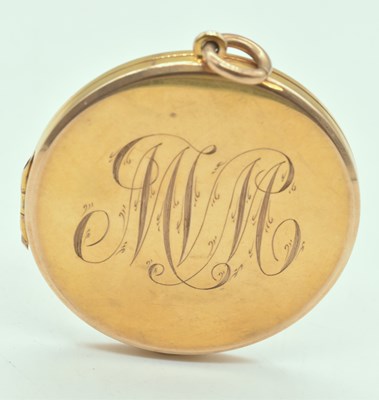 Lot 576 - A large 9ct yellow gold  locket, engraved with...