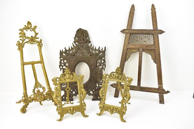 Lot 792 - Five collectable wood and brass picture frames...