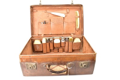 Lot 542 - A large vintage brown leather travel case,...