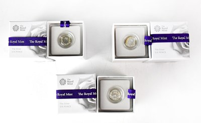 Lot 990 - THE ROYAL MINT; three cased silver sixpences...