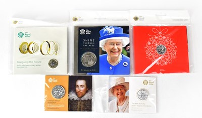 Lot 1000 - THE ROYAL MINT; five packaged coins comprising...