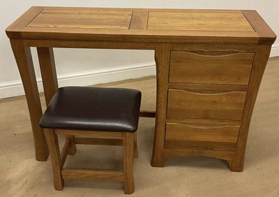 Lot 854 - OAK FURNITURE LAND; a dark oak dressing...