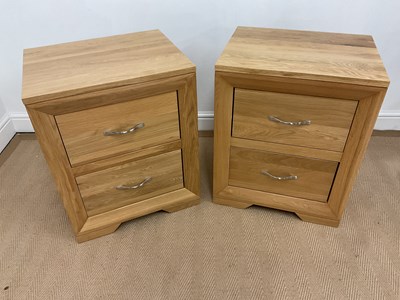 Lot 853 - OAK FURNITURE LAND; two light oak bedside...